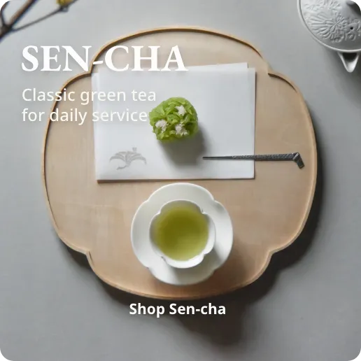 Tea cup with green tea and a green tea cake on a wooden tray, with text promoting Sen-cha green tea.